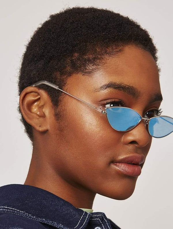 Skinnydip London | Blue Almond Sunglasses - Model Image 1