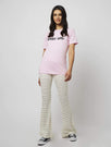Skinnydip London | Pink Baby Girl T-Shirt - Model Shot 3