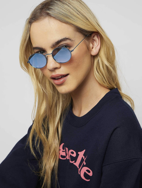 Skinnydip London | Blue Oval Sunglasses - Model Image