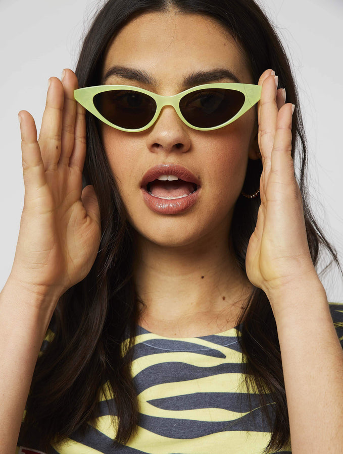 Lime Cat Eye Sunglasses | Sunglasses | Skinnydip London - Model Image 1