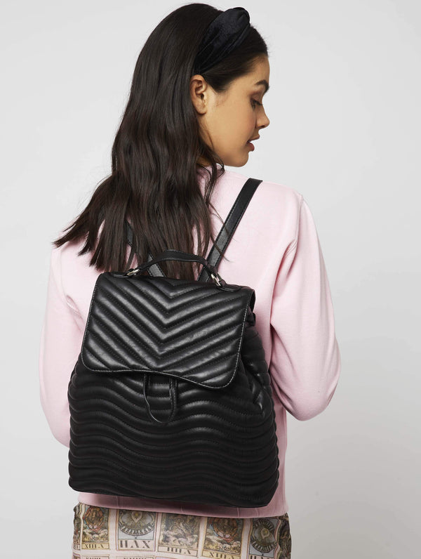 Skinnydip London | Lyla Black Backpack - Model Image 1