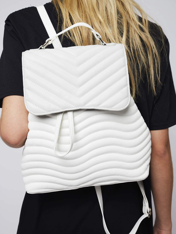 Skinnydip London | Lyla White Quilted Backpack - Model Image 1