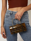 Skinnydip London | Mina Tort Clutch Bag - Model Image 1