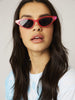 Skinnydip London | Neon Pink Cat Sunglasses - Model Image 2 