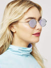 Skinnydip London | Purple Oval Sunglasses - Model Image