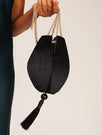 Skinnydip London | Ida Black Clutch Bag - Model Image 2
