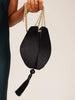 Skinnydip London | Ida Black Clutch Bag - Model Image 2