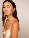 Skinnydip London | Gold Scrunch Earrings - Model Image 1