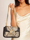 Skinnydp London | Lexi Snake Cross Body Bag - Model Image 1