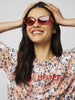 Skinnydip London | Vanessa Red Sunglasses - Model Image 1